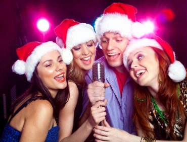 4 People Singing Holiday Songs