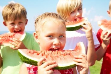 Kids eating Watermelon